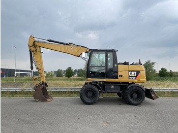 Ratastel ekskavaator CATERPILLAR M313D