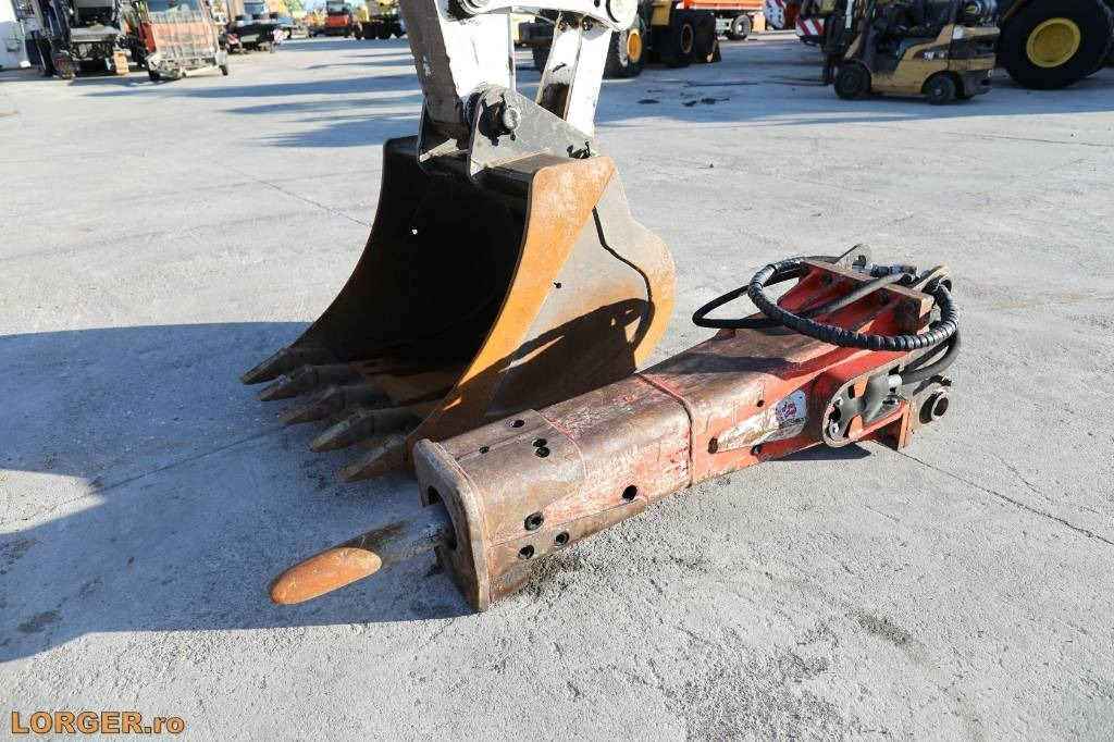 Ratastel ekskavaator New Holland MH 6.6 + Sandvic Hammer: pilt 19