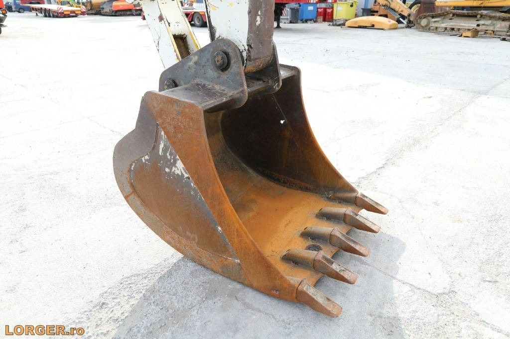 Ratastel ekskavaator New Holland MH 6.6 + Sandvic Hammer: pilt 9